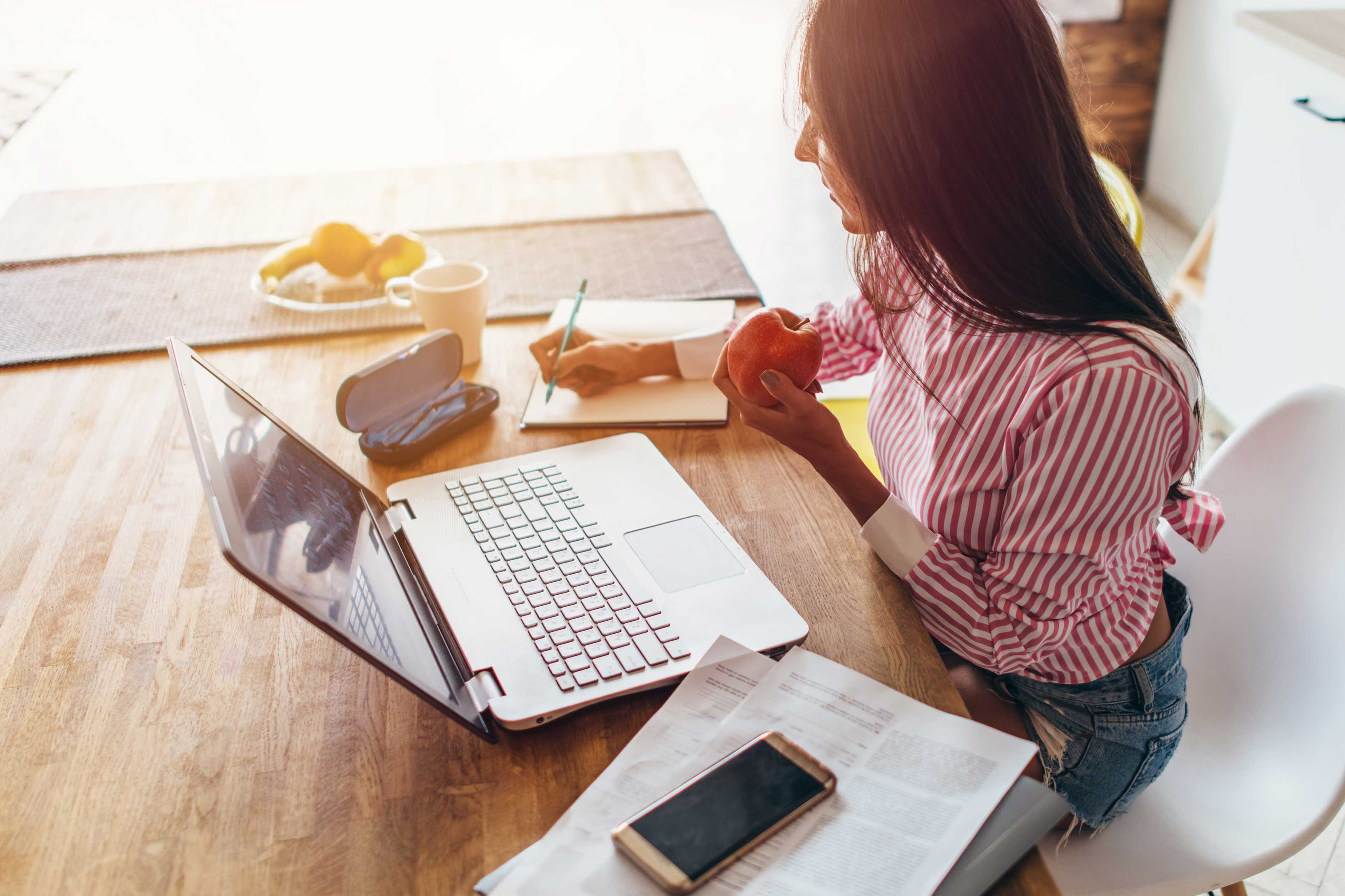 People---Female---Young-woman-at-home-planning-family-budget-and-finances---1011866320