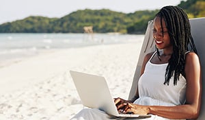 Woman conducting business on vacation